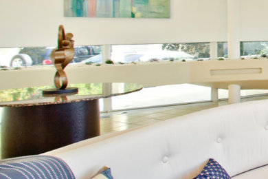 Example of a beach style living room design in Los Angeles