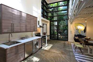 Kitchen - industrial kitchen idea in Charlotte