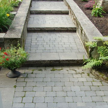 Landscaping with pathways, steps, retaining wall, garden