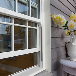 Sliding Sash windows on a Hampton style home - Windows