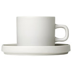 blomus - Pilar Coffee Cups With Saucers, Set of 2, Moonbeam - Coffee Cups with Saucers are functional for every occasion. Make the coffee twice as tasty with this set of 2. The PILAR coffee cup and saucer has what it takes to become a favorite accessory for coffee lovers. Beautifully shaped yet humble enough to act as a discreet backdrop to the perfectly arranged meal. The new PILAR tableware collection was designed by Floz Design in Germany. Stoneware pieces include bowls, plates, mugs and serve ware. The full range comes in three matching colors: moonbeam, agave green and mirage gray. Start setting the table with your own unique color combinations. Outside of stoneware is matte. Inside serving area is glazed for design compliment and easy cleaning. PILAR stoneware is manufactured from clay, quartz and minerals such as calcite and is defined as a ceramic product. The stoneware is molded at very high temperatures using casting techniques. The high temperatures during the firing process make stoneware more stable than clay and less translucent than porcelain. Due to the heating and glazing processes of stoneware, these pieces may have slightly different attributes which can add to their beauty and uniqueness.