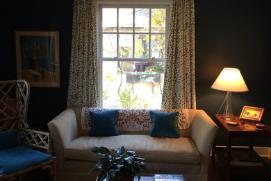 Small transitional enclosed dark wood floor family room photo in Chicago with blue walls, no fireplace and a media wall
