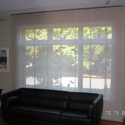 Skyline Gliding panels - Roller Shades