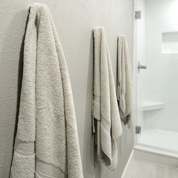 Contemporary and Bright Twin Bathrooms