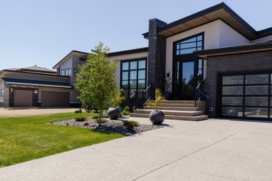 Design ideas for a modern front yard landscaping in Calgary.
