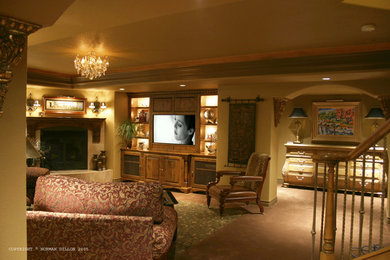 Inspiration for a mid-sized timeless walk-out carpeted basement remodel in Denver with beige walls, a standard fireplace and a stone fireplace