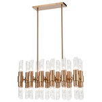 Elk Home - Carisbrooke 24-Light Linear Chandelier - Contemporary design and luxe style combine to create the Carisbrooke linear chandelier. Made from steel and clear, ribbed glass tubes, this piece comes in a burnished brass finish, setting it apart as a unique statement of modern chic. Illuminated by twenty-four bulbs, it is an ideal option for lighting a kitchen island or dining area. Matching pieces are also available in this collection.