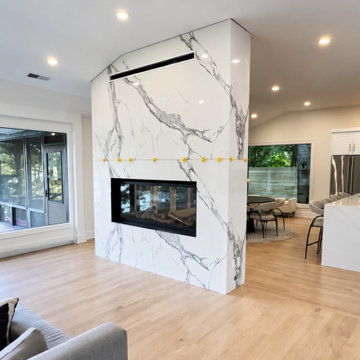 CUSTOM FLOOR-TO-CEILING FIREPLACE WITH MITERED RETURNS