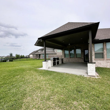 Backyard Upgrade: Patio Cover with Outdoor Kitchen and Extended Concrete Patio