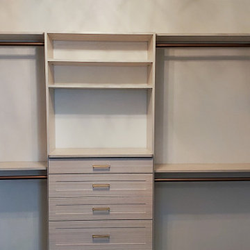 Custom master closet with full length mirror cabinet & matte gold hardware!