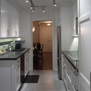 Condo White Galley Kitchen