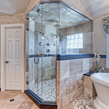 Expansive Traditional Steam Shower in a Spa Like Master