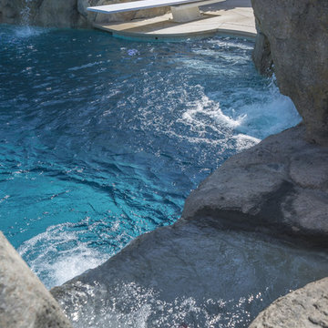 Pool with Diving Board and Waterfalls