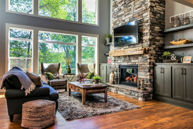 Inspiration for a rustic living room remodel in Grand Rapids