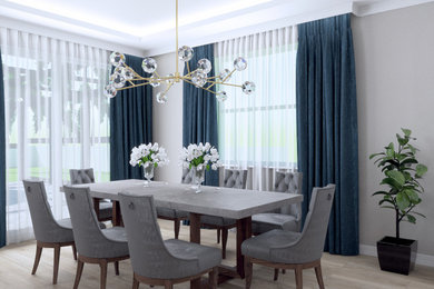 Example of a mid-sized trendy light wood floor and beige floor kitchen/dining room combo design in Tampa with beige walls