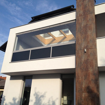 Balkonverglasung mit Sunflex Schiebe-Dreh-System SF 25 (Faltelement)
