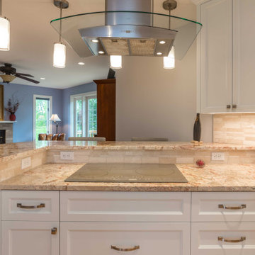 Modern Kitchen with White Flat Panel Shaker Cabinets & Natural Stone Backsplash