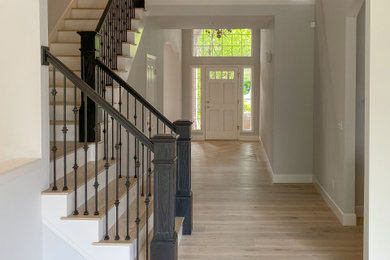 Example of a trendy staircase design in Seattle