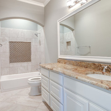 Traditional Brick & Stone with a Glamorous Interior