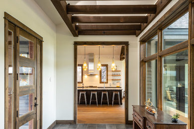 Entryway - rustic entryway idea in Other