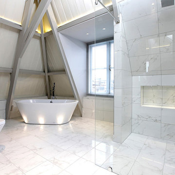 Large Bathroom using clean white marble Porcelanosa Tiles