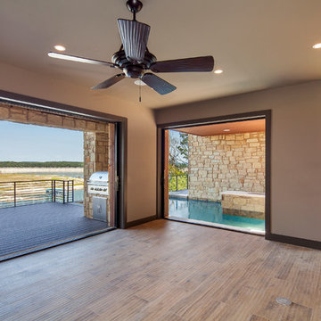 Entertaining room opens to outdoor living area- Lake Travis Waterfront Custom Ho