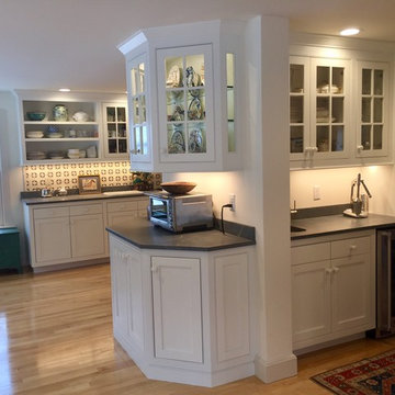Kitchen with tiger maple and angled cabinets