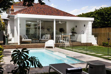 Design ideas for a mid-sized traditional pool in Sydney.
