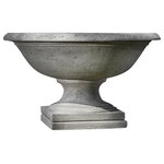 Campania International - Monteros Urn Garden Planter - Despite its conventional urn design, the Monteros Urn Garden Planter is far from drab. It's size, at 47" at its widest, makes it a magnificent sight to behold. Designed to house and showcase large, complex blooms and lush greens, the Monteros Urn Garden Planter will not be overshadowed by the plant or plants it houses and instead will only grow more beautiful over time. Made out of cast stone and finished by hand in the stain of your choice, this piece will stand the test of time and will not chip or crack from exposure to the elements and will simply stand strong for years of attractive functionality.