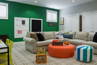 Elegant gender-neutral carpeted and beige floor kids' room photo in Chicago with green walls