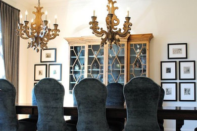 Example of a large classic enclosed dining room design in Phoenix with white walls