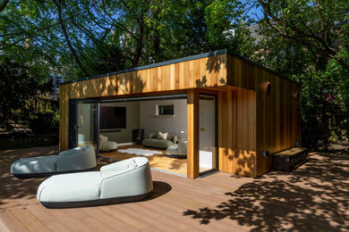 Inspiration for a contemporary shed remodel in Other