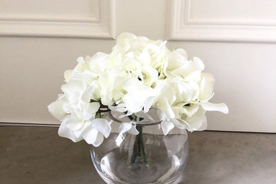 White Hydrangea in a Globe Vase