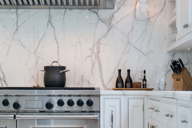 Example of a transitional kitchen design in Toronto