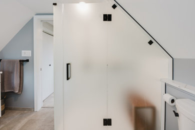 Mid-sized transitional master ceramic tile, beige floor and single-sink bathroom photo in DC Metro with shaker cabinets, white cabinets, quartz countertops, a hinged shower door, white countertops and a built-in vanity