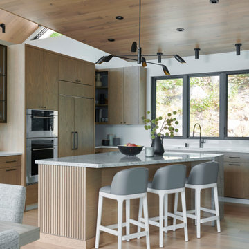Cottage Chic: White Oak Cabinets and Island Define Modern Elegance