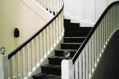 Inspiration for a victorian wood railing staircase remodel in Orange County