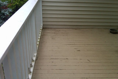Mid-sized classic front porch idea in New York with decking
