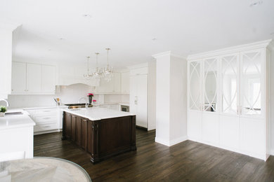 Example of a transitional kitchen design in Toronto