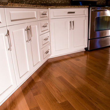 Transitional White Kitchen in Italian Laminate