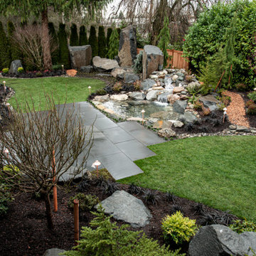 Bocce Ball Court, Pond, Granite Rocks and Dimensonal Flagstone