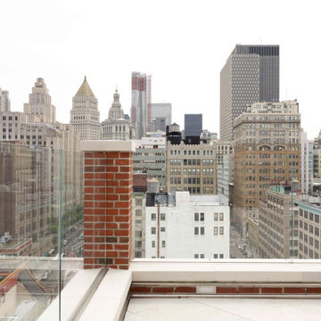 A minimal glass railing maximizes the views