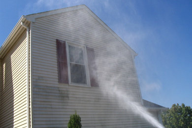 Don't waste money replacing siding. Hire a pro to clean it!