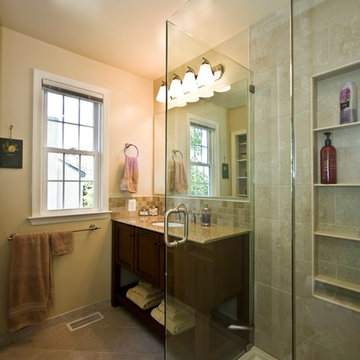 Diagonal tile flooring and lots of light make a spacious bathroom