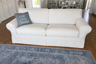 Living room - coastal living room idea in Miami