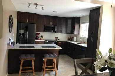 Example of an arts and crafts kitchen design in Vancouver