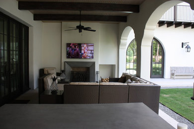 Example of a tuscan patio design in Houston