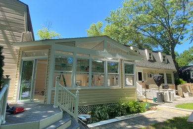 Inspiration for a large modern gray floor sunroom remodel in DC Metro with a skylight