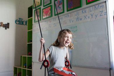 Kids' room - small contemporary carpeted kids' room idea in San Francisco with white walls