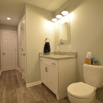 Subway Tile/ Faux Wood Plank Bath